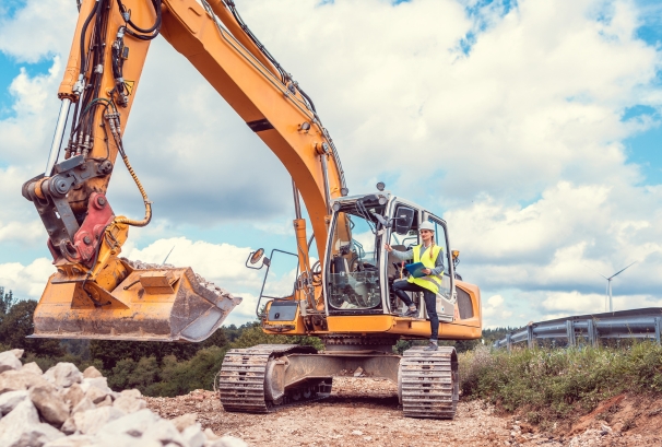 Construction site with workers and heavy equipment